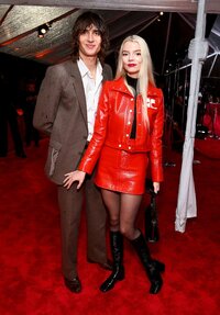 Anya-Taylor-Joy-Red-Mini-Skirt-Upskirt-1.jpg